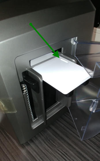 card in machine with opening on the card on the back