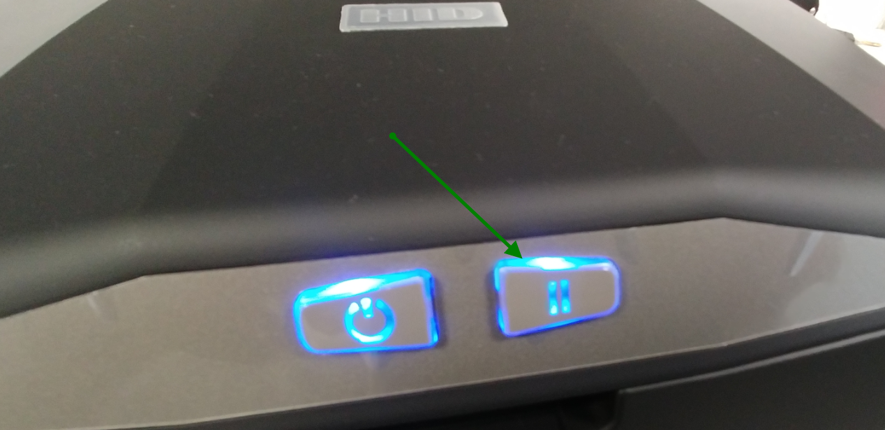 pause resume button on the right of DTC1250e printer